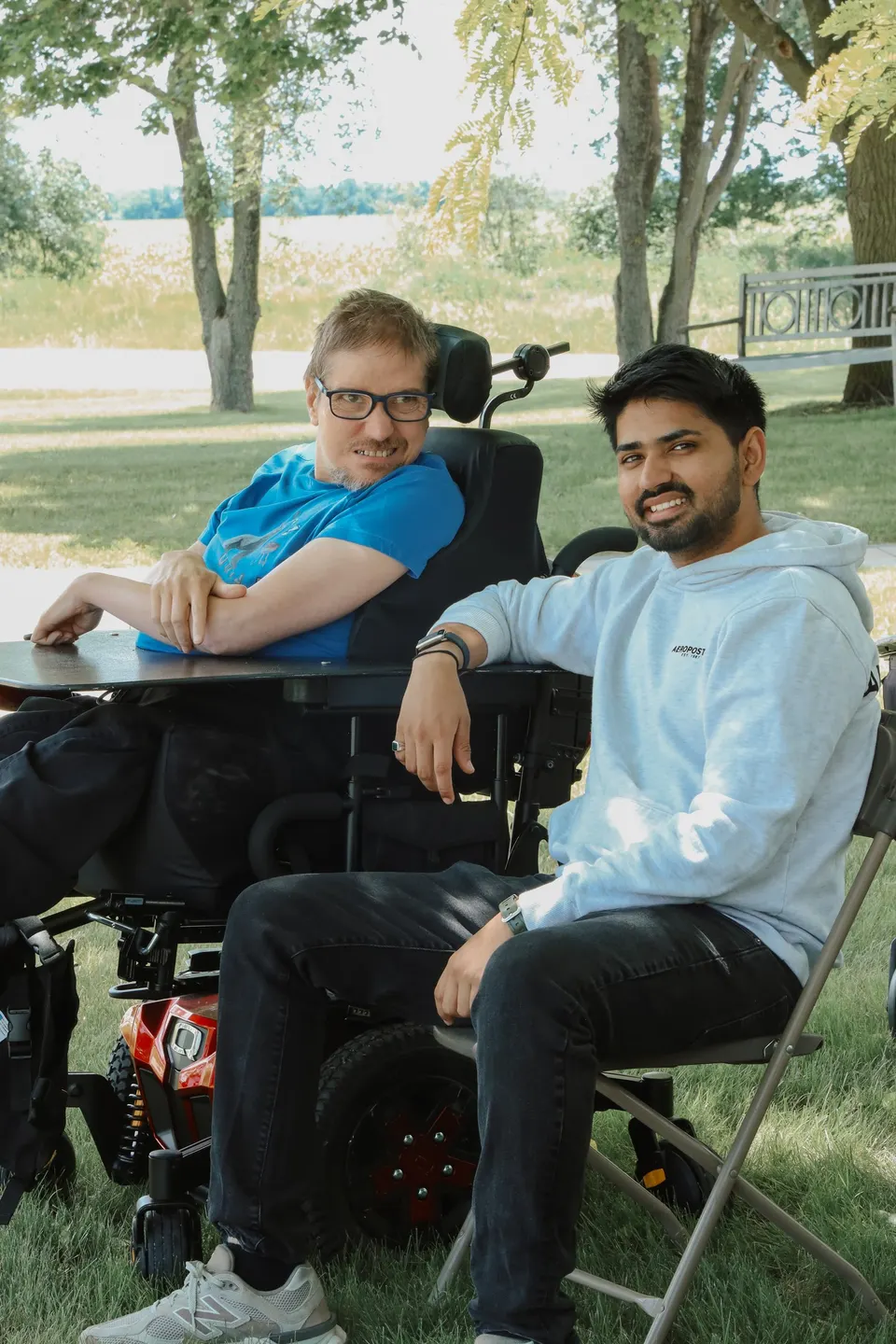 Two friends smiling together at the Southern Cruisers charity ride